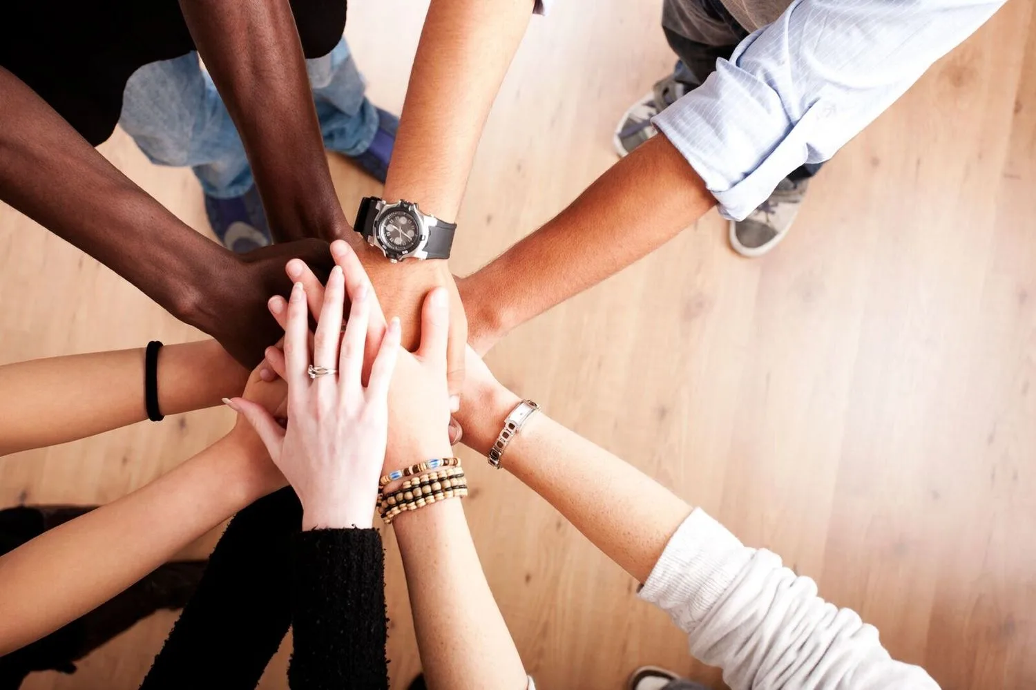 Volunteering hands unified for community transformation